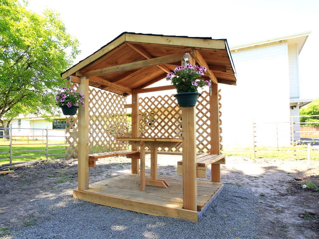 Simple backyard gazebo with floating benches