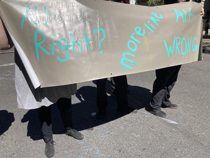 A banner from Pop Mobs Banner Bloc Party counter-protest.