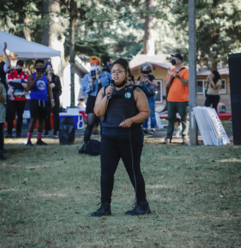 Speaker Ragina Rage addresses the crowd at Lents Park.