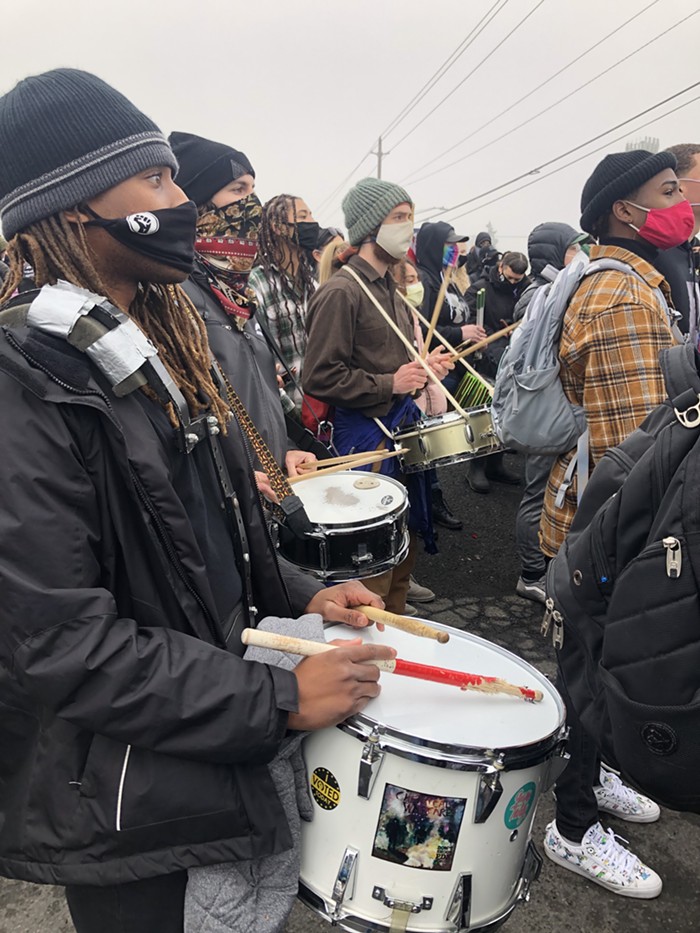 A drumline keeps the march moving through Hazel Dell.