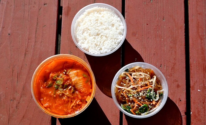 Kimchi soup with a side of japchae and rice