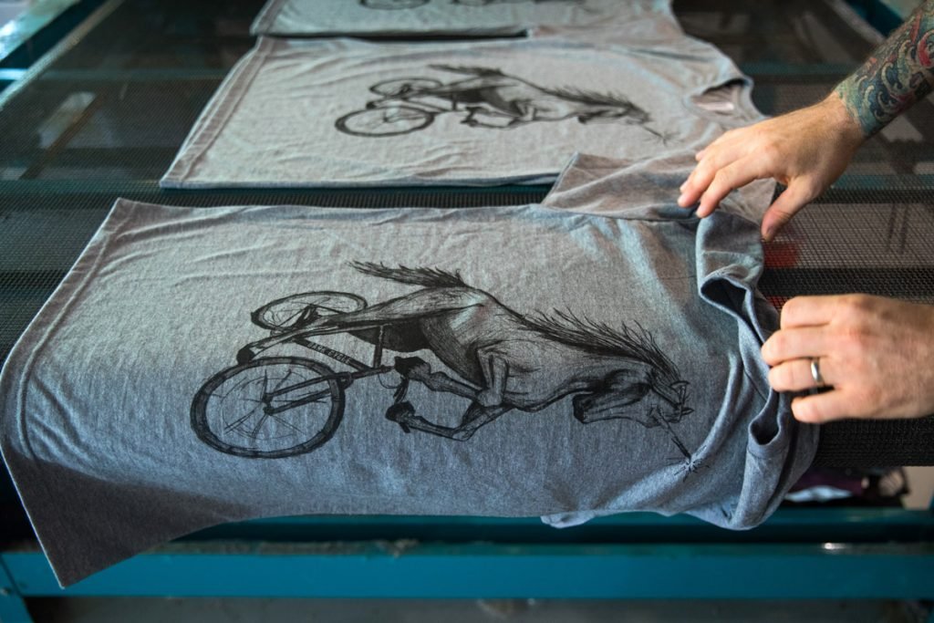 A screen printed shirt from Dark Cycle Clothing is made. 