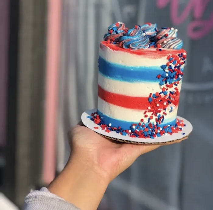 DB Dessert Companys red, white, and blue baby cake is ready to be the centerpiece of your Fourth of July meal.