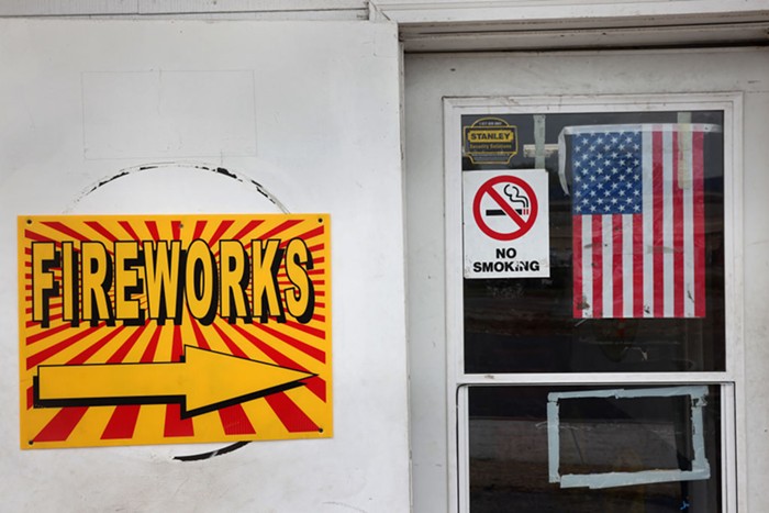A store with a sign advertising fireworks